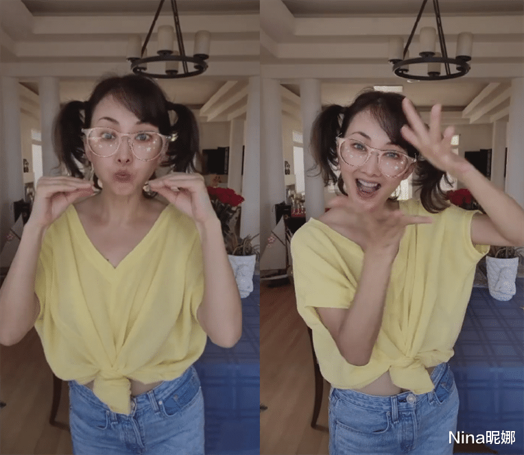 【t恤】47岁牛莉在家真“奔放”，穿T恤故意打结跳舞，扎双马尾似小萝莉