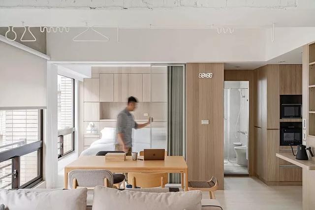 56㎡小户型把客餐厅做全开放，一个人住也舒服自在。