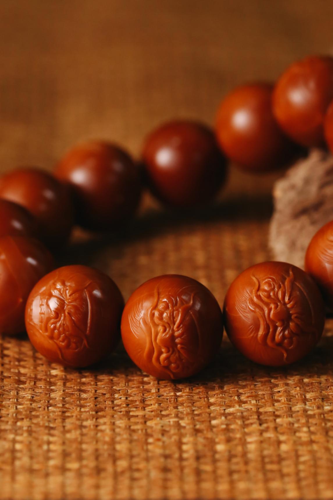 橄榄核|橄榄核鸡血红核是什么核？鸡血红核值钱吗？