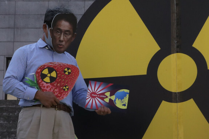 韩国|韩国团体戴日本首相面具抗议排污入海:将危害人类共同资源