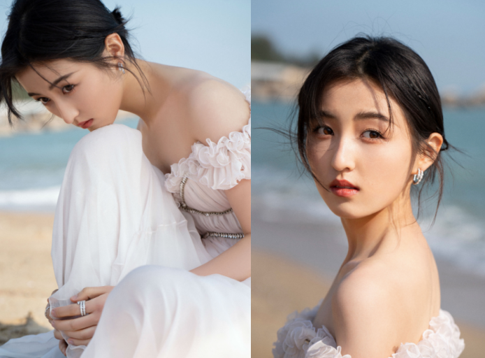 张子枫|张子枫光脚躺沙滩上拍照！穿短上衣露一截细腰，怕冷裹绿色大衣