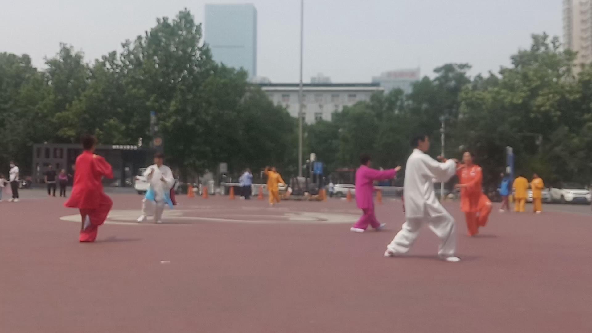 阿弥陀佛慈愿王北斗 5.19观故乡妻与各县区参加市太极拳交流比赛并念佛有感