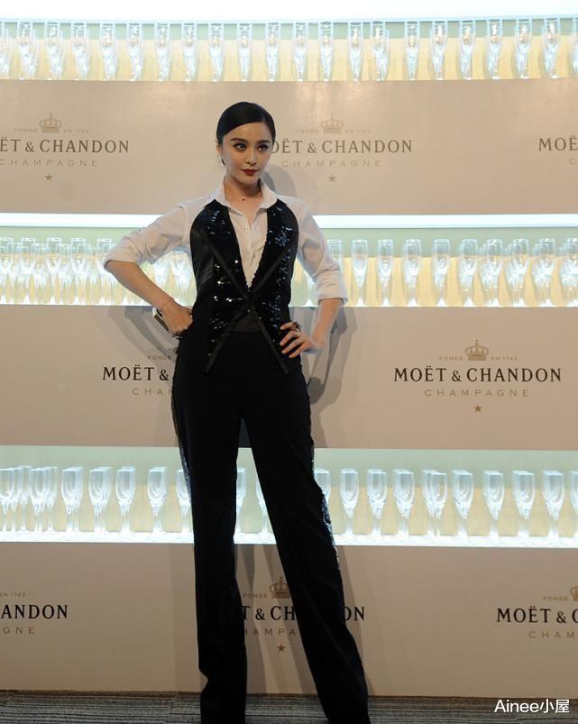 Ainee小屋 范冰冰的气场一点没变,马甲西装配黄T恤,看得出有女强人的风范