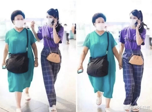 伊能静|伊能静陪婆婆走机场，扎斜马尾配粉包真显嫩，比一旁秦昊看着还小