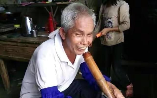 广西 广西第一猛男梁二:娶小30岁娇妻21年生15个孩子走红网络