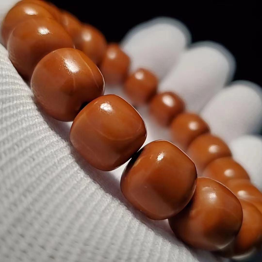 橄榄核|橄榄核三角孔一定是铁核吗？橄榄核铁核几个月能盘红？