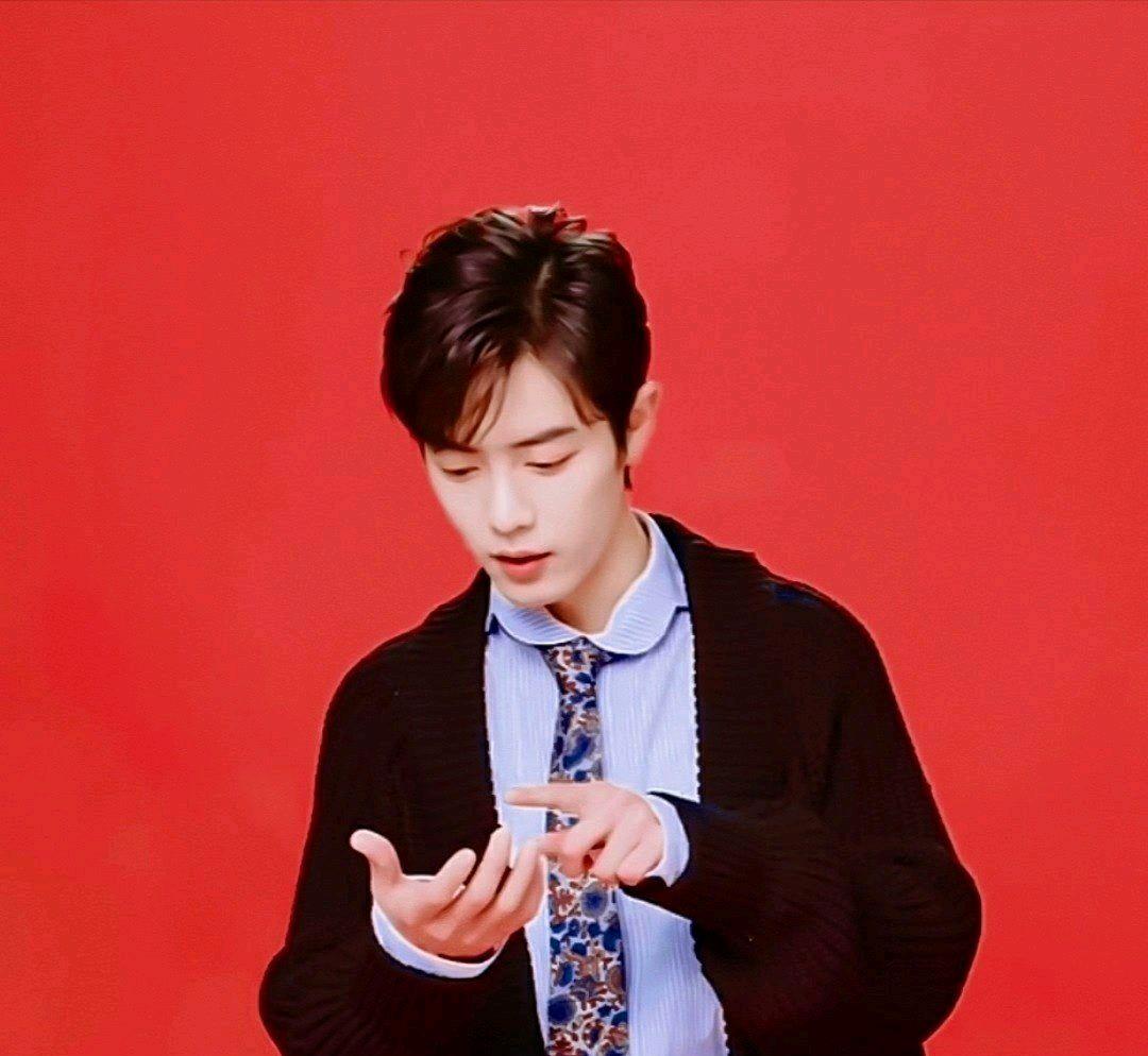 肖战|《全娱乐电视》官博点名肖战，认为肖战和红色很配，看了心动