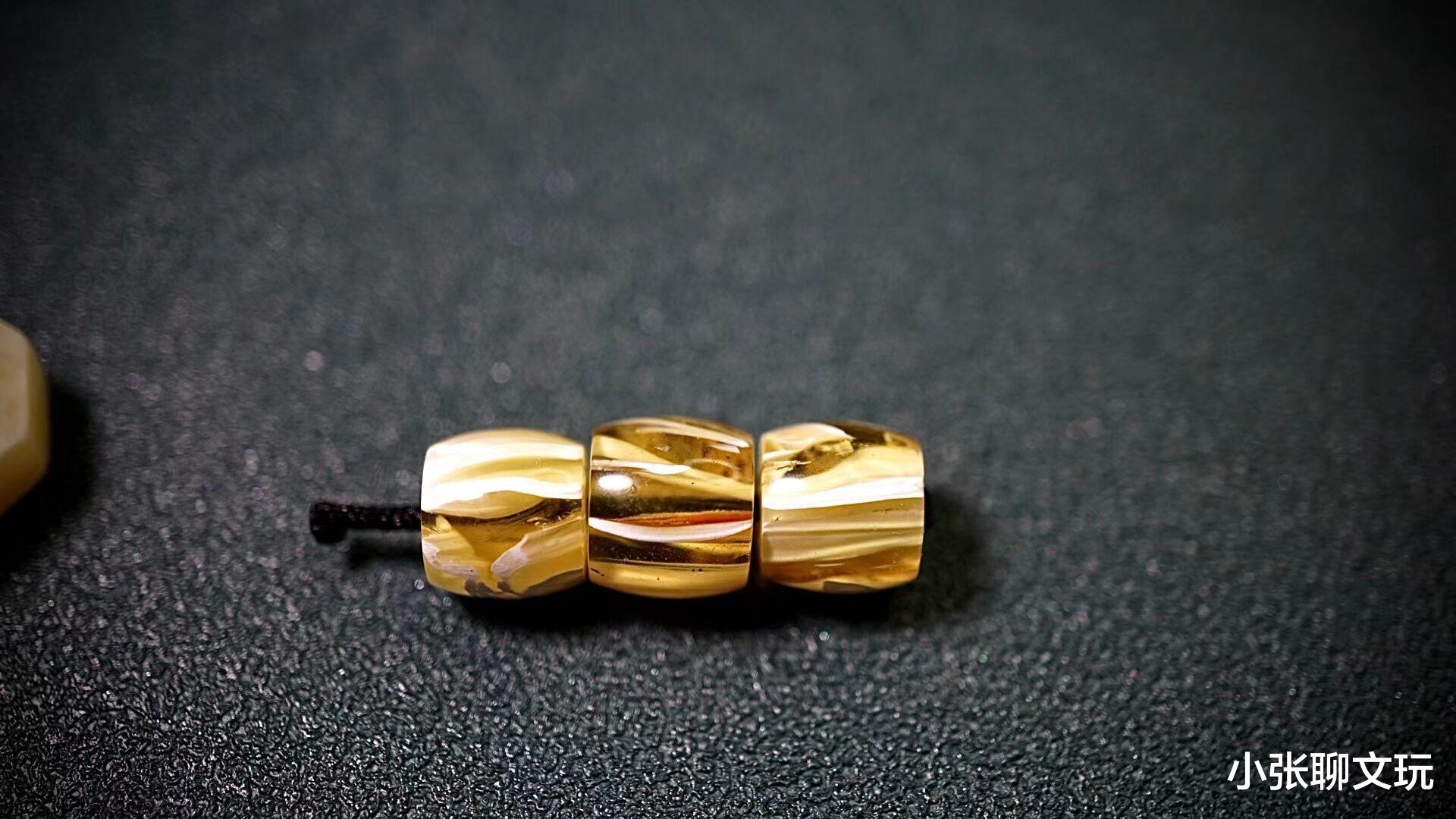 光绪元宝|百搭的文玩配饰有哪些？造型可以多变，颜色更加重要