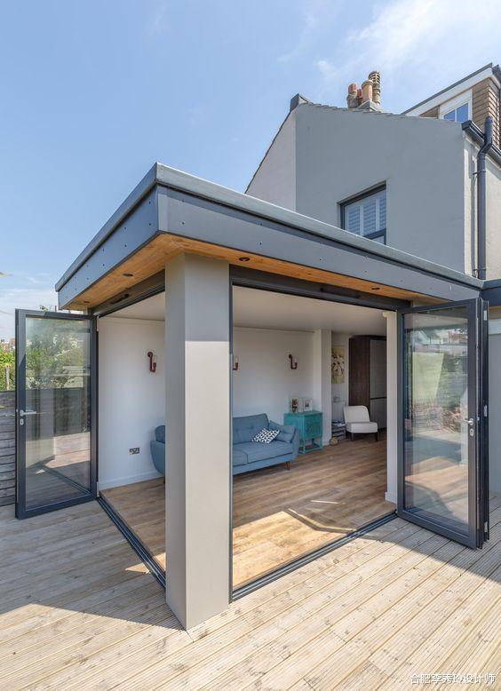 客厅|大门换成12扇折叠门，把客厅和庭院融为一体，L型没有“边界感”