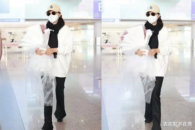 衣在配不在贵 闫妮的围巾戴得有点早,别人配大衣和风衣,她却配卫衣,仍惊艳了
