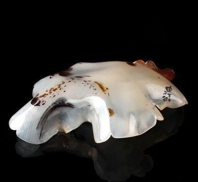 舜网 男子在河边捡到一块蓝色石头,专家:价值估计是上千万