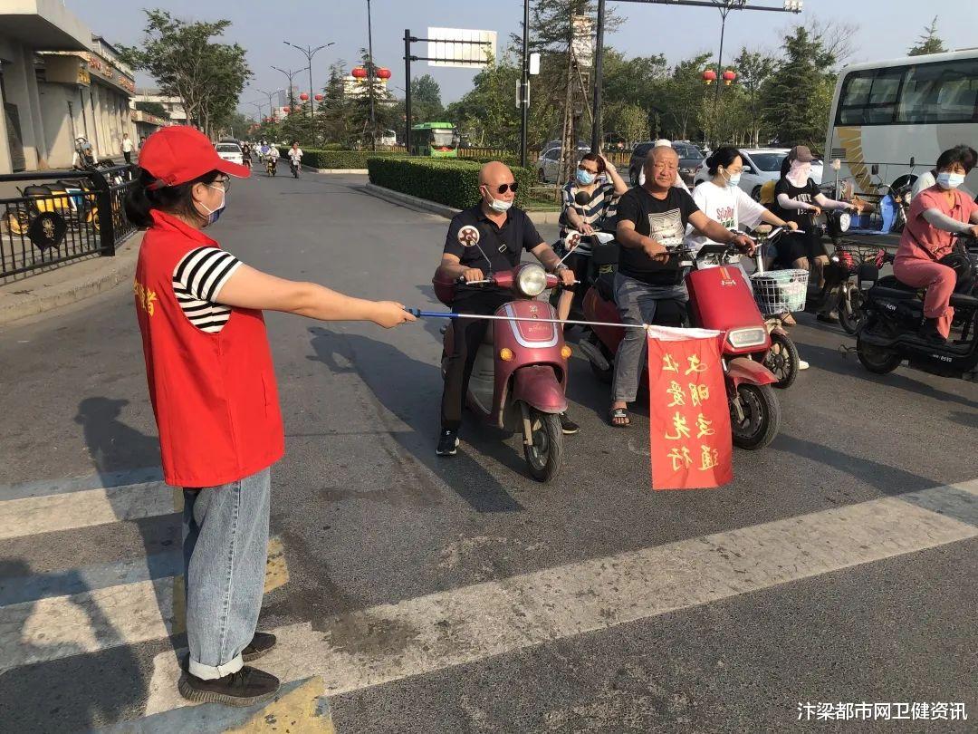 汴梁都市网卫健资讯|开封市人民医院开展文明交通志愿者服务活动