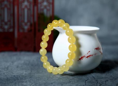 牡丹一元|鉴别蜜蜡真假的几种方法,不懂可就亏了!