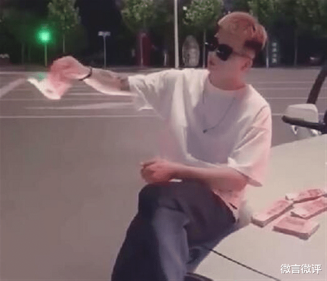 微言微评 坐在宝马车上烧钱,有钱也不能这么任性