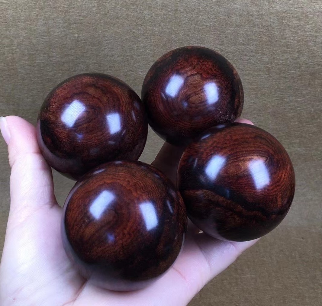留一半醉|海南黄花梨保健球的价格标准怎样区分?