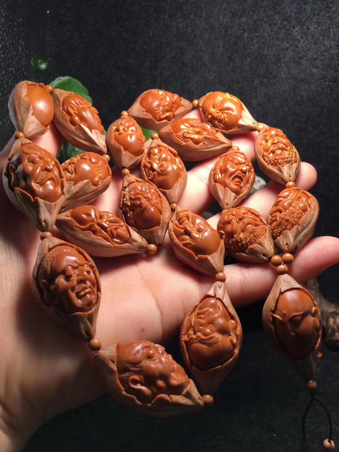 橄榄核雕|橄榄核雕的黄金尺寸多大？橄榄核手串什么尺寸的最好？