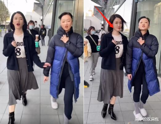 李小冉|45岁李小冉街头录视频！裙摆飞扬露出一截小腿，肤色白嫩十分娇俏