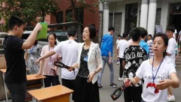 月落等风來|武汉考生在高考过程中，拿出手机“拍照搜题”，教育部回应来了