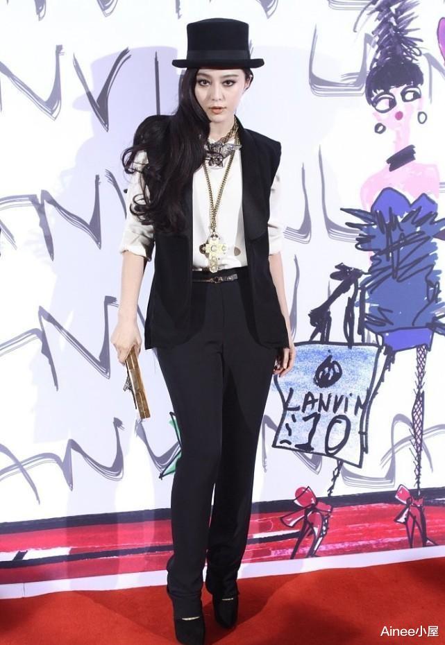 Ainee小屋 范冰冰的气场一点没变,马甲西装配黄T恤,看得出有女强人的风范
