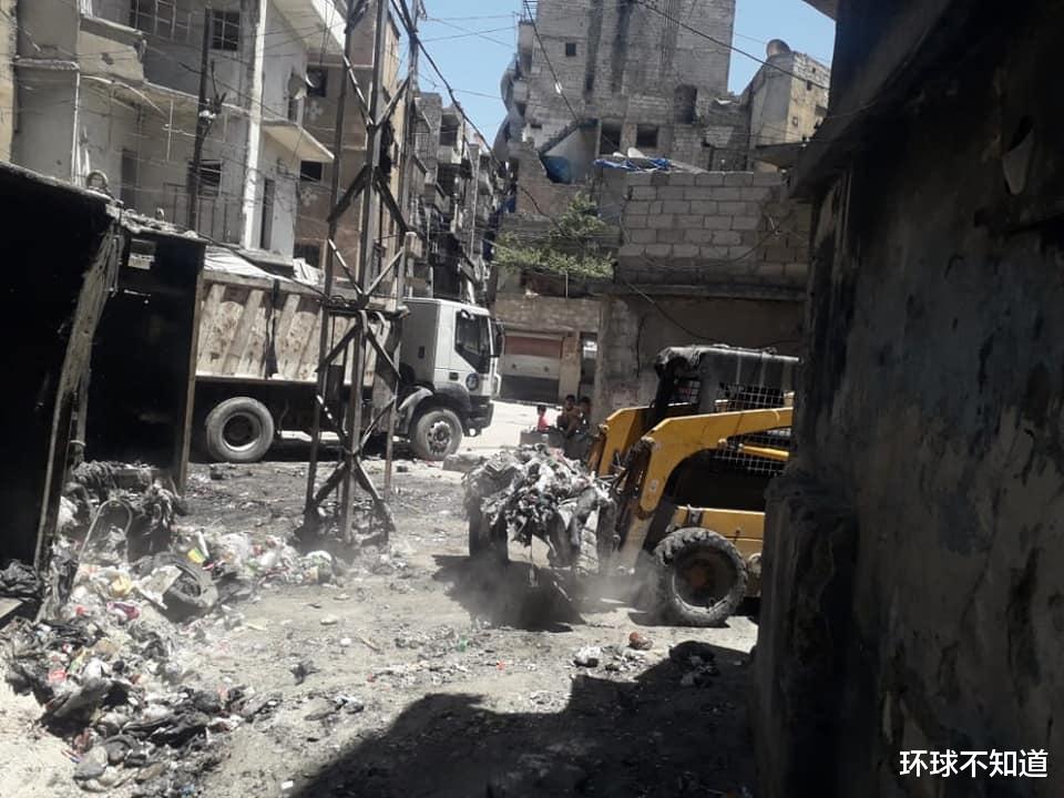 敘利亞重建：阿勒頗的工人師傅操作機械鋪瀝青，開始免費打疫苗-圖4