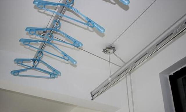 邻居家装修标新立异,晾衣架装在客厅,有客人来居然能隐形看不见