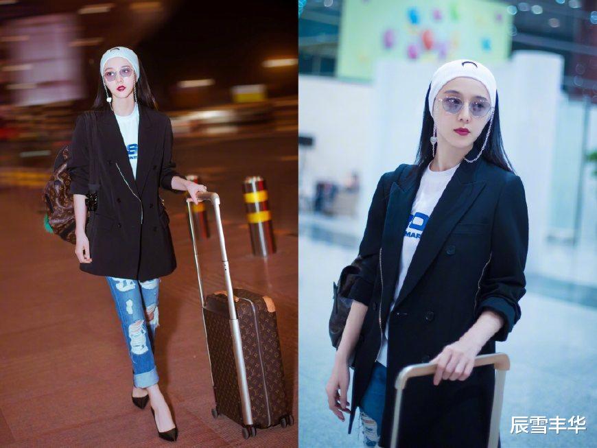 辰雪丰华 范冰冰穿得有点“顾下不顾上”了,上衣搭配显魁梧,还好腿比较细