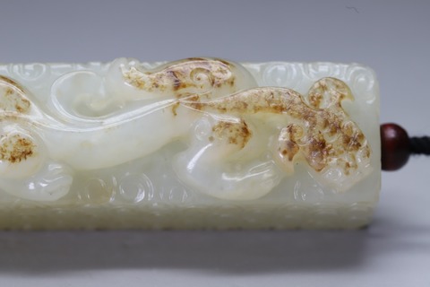 和田玉籽料|舊藏和田玉籽料“枣红皮 螭龙勒子”