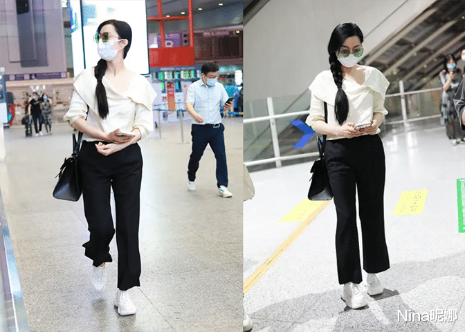 Nina昵娜|范冰冰深夜赶机太凄凉,穿衬衫无人接,扎棍粗长辫发量惊人似大姑娘