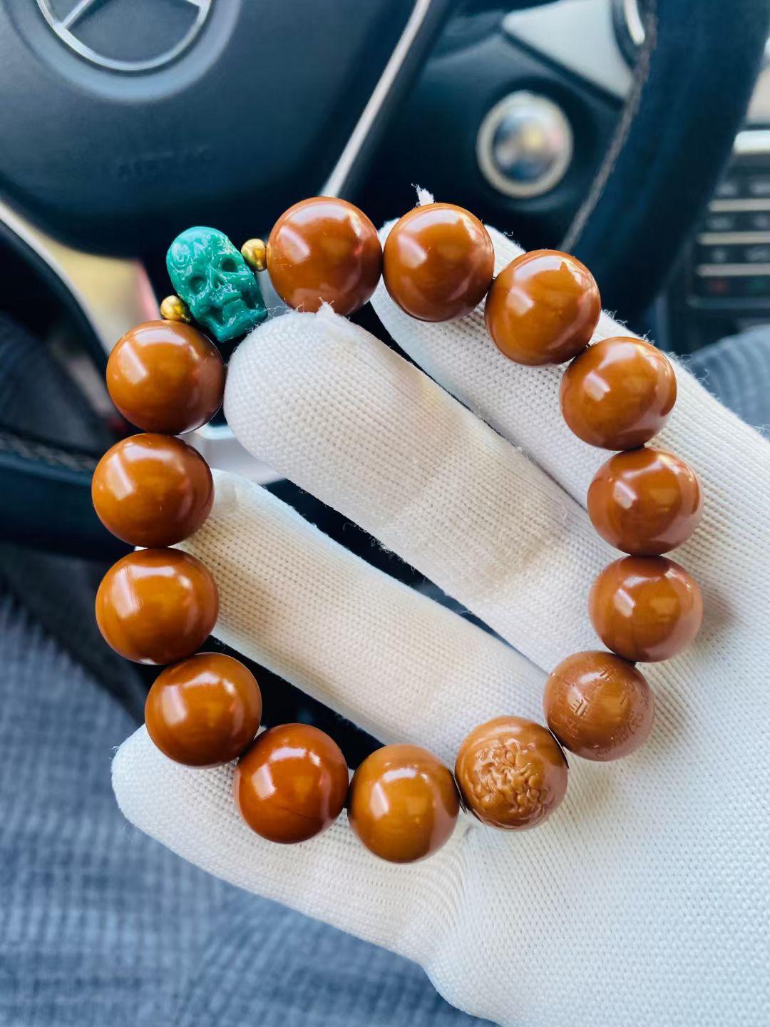 新疆维吾尔自治区|橄榄核雕配什么三通好？核雕与三通之间不好盘怎么办？