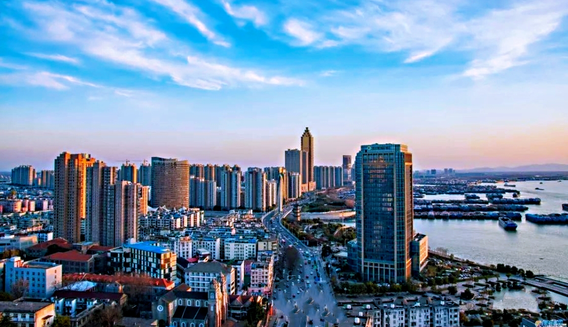 麻城漫谈 我国5个省区，因为发展水平低于所在大区，划分经济区时被迫退群