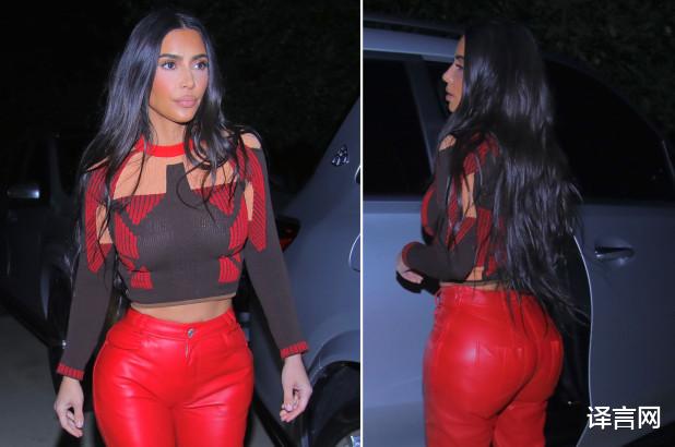 |40岁金·卡戴珊开百万豪车，及膝红皮裤引领新时尚，勒到小腹突出