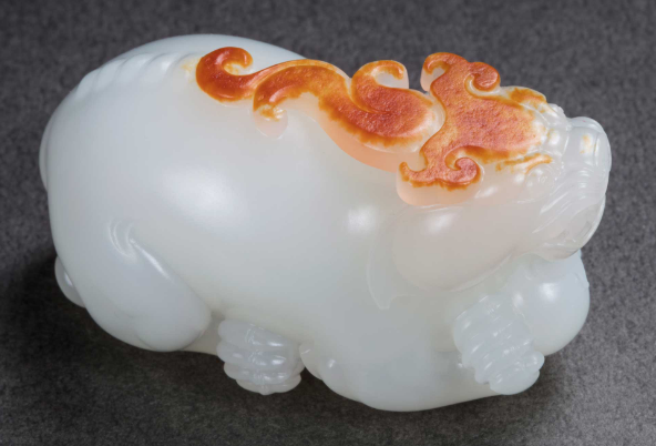 和田玉籽料|和田玉红皮籽料有何特点？造假的红皮料什么样？为何价格这么高？