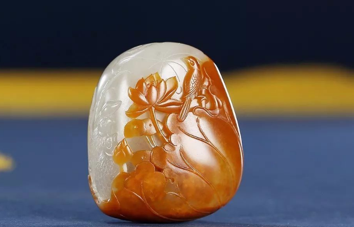 和田玉籽料|和田玉红皮籽料有何特点？造假的红皮料什么样？为何价格这么高？