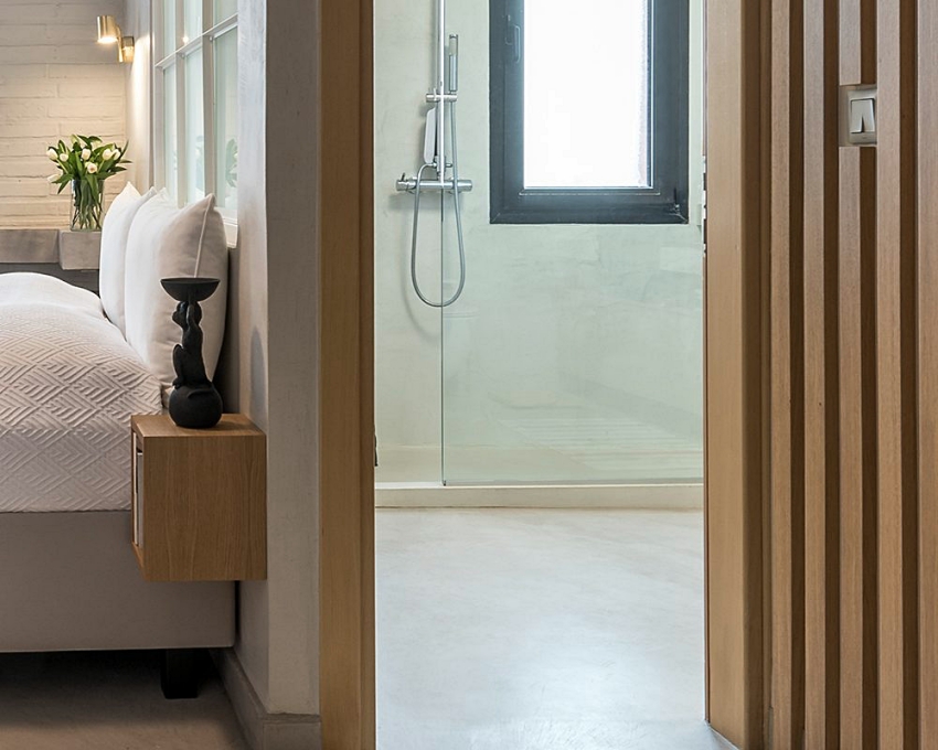 【希腊建筑事务所】灰阶色彩与木质调形塑轻盈宽敞感