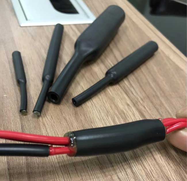 双壁带胶热缩管溢胶过多原因及改善办法