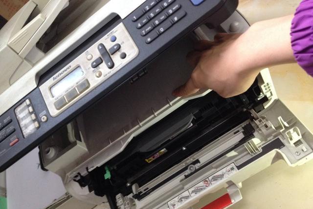 华为|打印机卡纸在滚轴部位怎么办？