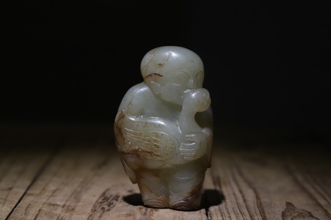 |舊藏和田玉“枣红皮 童子戏鹅”