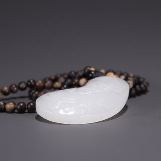 和田玉籽料|旧藏·和田玉籽料羊脂白雕双狮戏球挂件