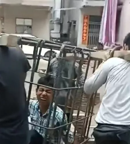 广东湛江,一男子在焊钢筋时一不小心把自己给焊在里面无法脱身了