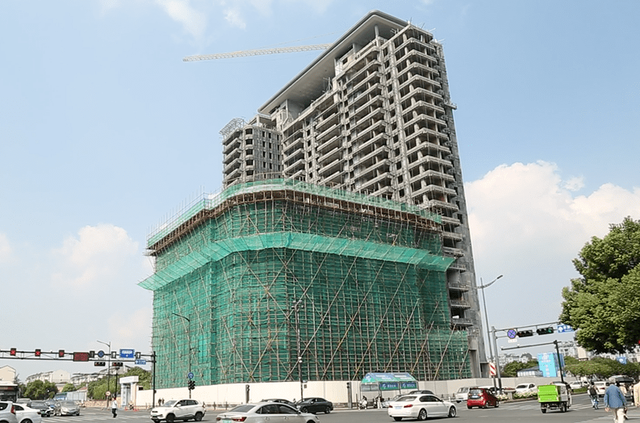 境内游|杭州有处烂尾楼片区,坐拥黄金地段,烂尾22年后却奇迹般复工