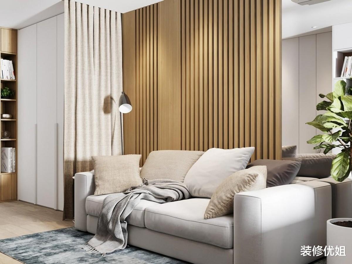 小伙为32㎡小家节省空间，把床藏衣柜里面，效果不是一般的高级