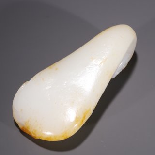 和田玉籽料|旧藏·和田玉籽料龙钩型原石雕