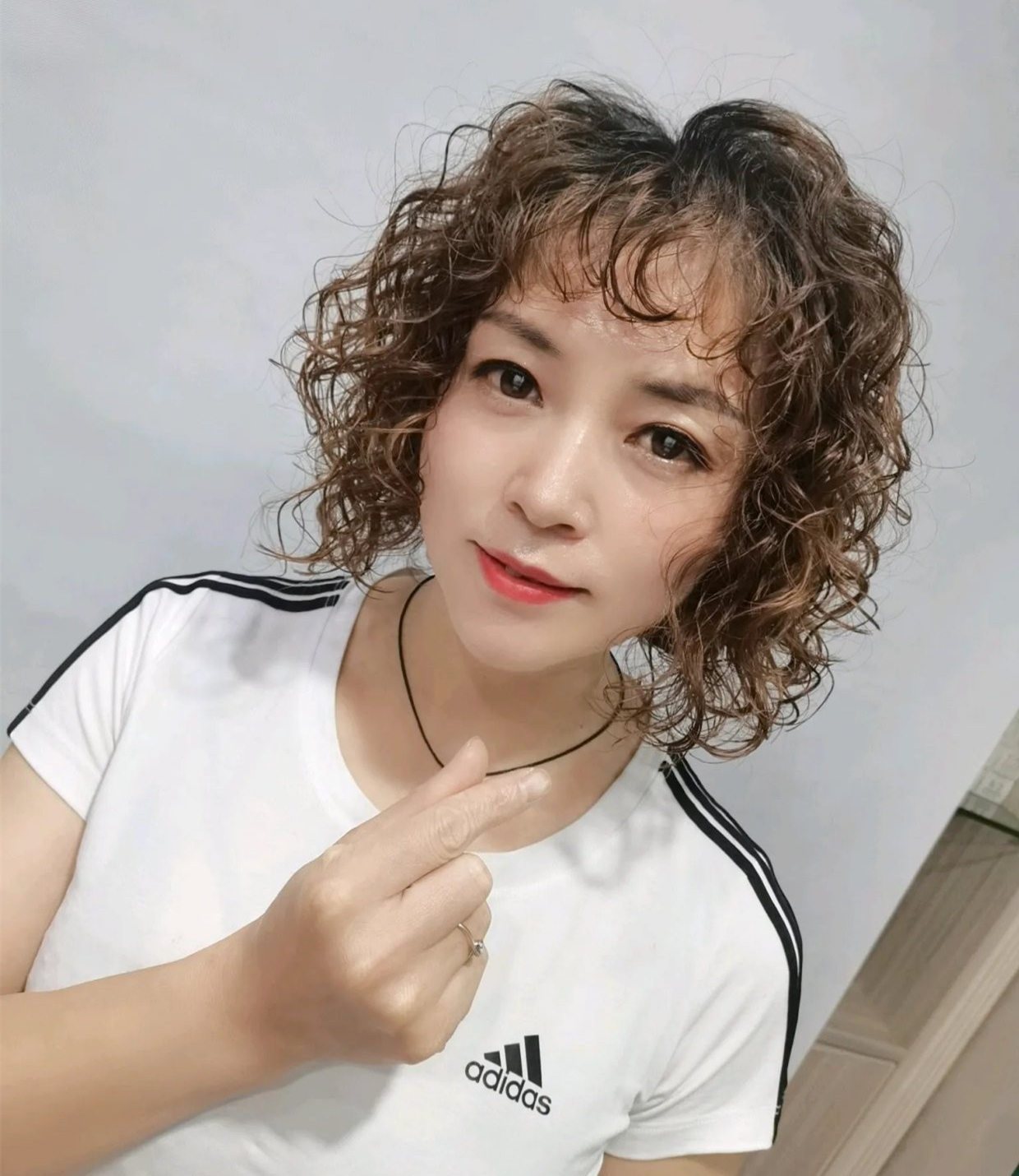 发型 50岁女人烫什么发型显年轻?十款洋气减龄卷发,显气质又有品位