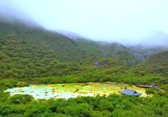 荷花|中国保护完好的高原湿地、奇特的钙华景观、“人间瑶池”——黄龙