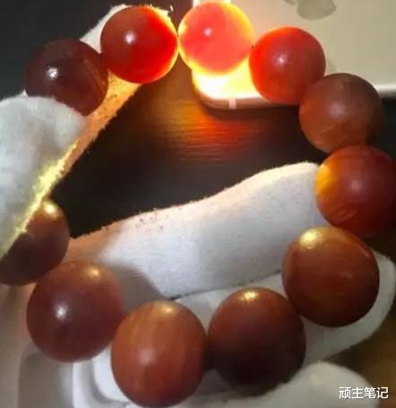 琥珀|这不是我们小时候点火用的吗?现在怎么被车成了手串还那么漂亮!
