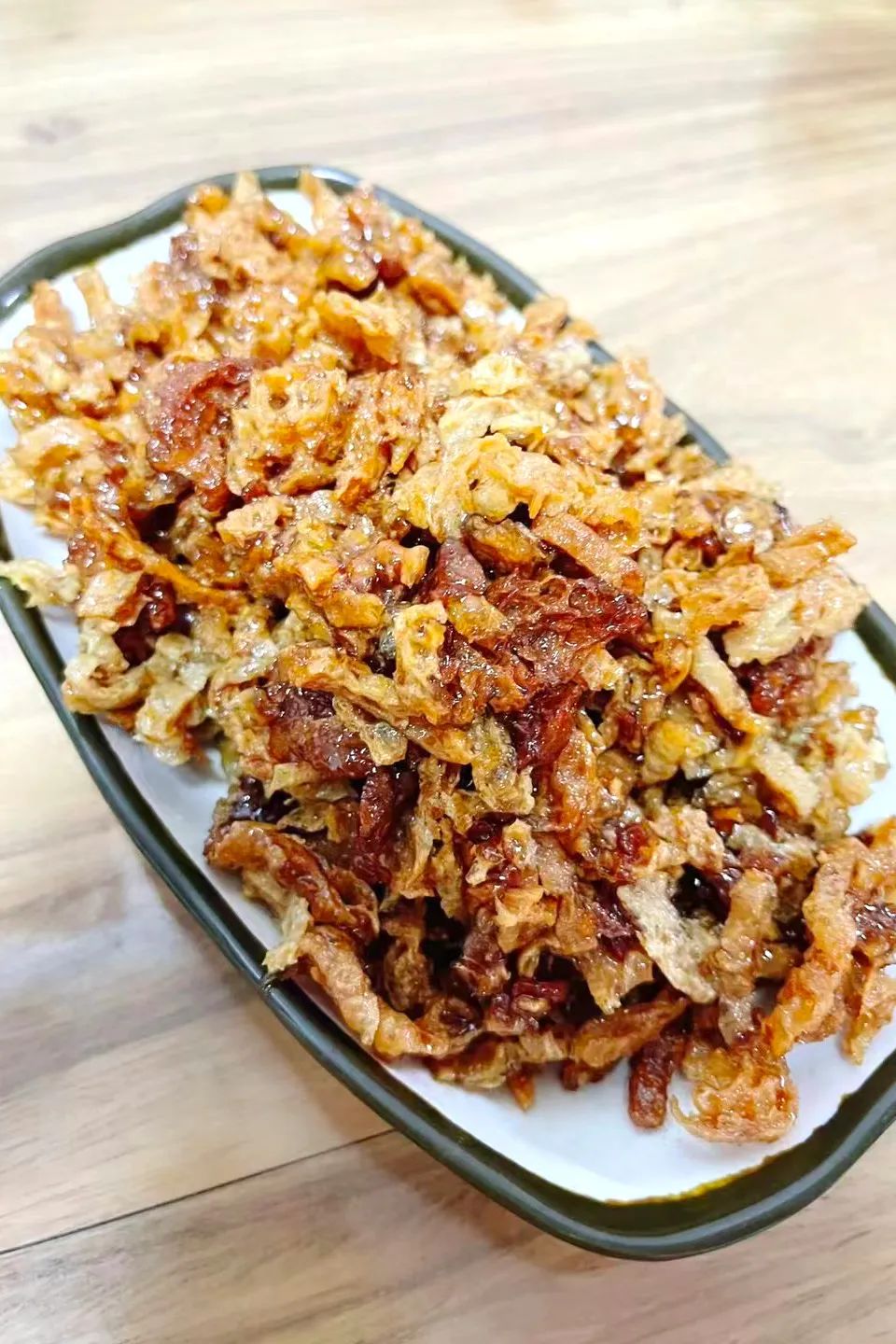 能让天津人放下煎饼馃子的，也就那碗捞（láo）面了！