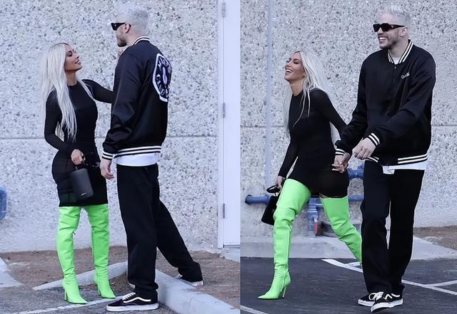 金·卡戴珊|金卡戴珊现身街头秀恩爱!穿绿色过膝长靴显长腿,小男友满脸幸福