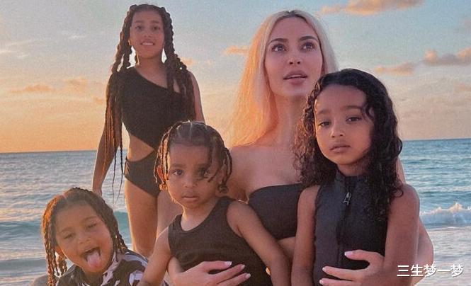 金·卡戴珊|卡戴珊陪儿子看球赛,极致臀腰比!留住4娃,家族未来赚钱工具