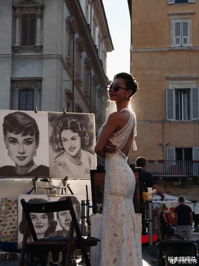 贾宏伟|43岁贾宏伟晒环游欧洲画面!甜蜜分享妻子近照,穿露脐装秀水蛇腰