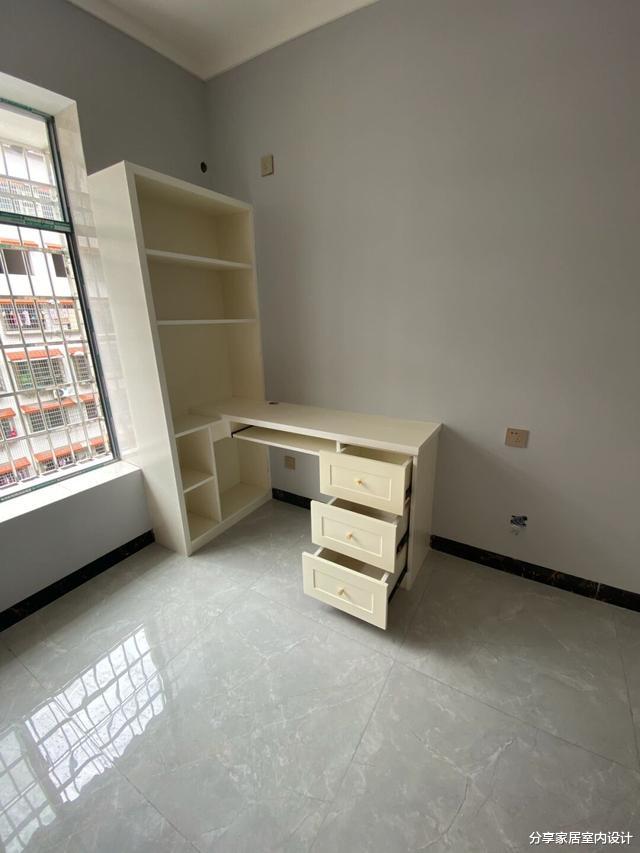 她第一次装修新房，自己设计，全屋请木工师傅打柜子，非常满意！